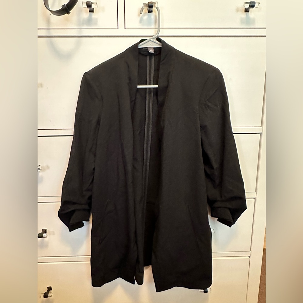 Black Blazer, The Limited